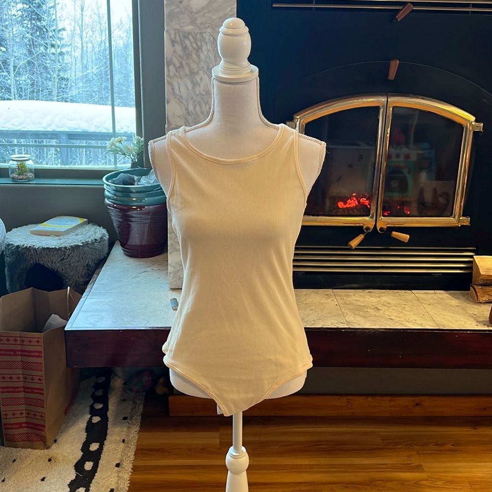 4 Backless Cross-Back Bodysuits